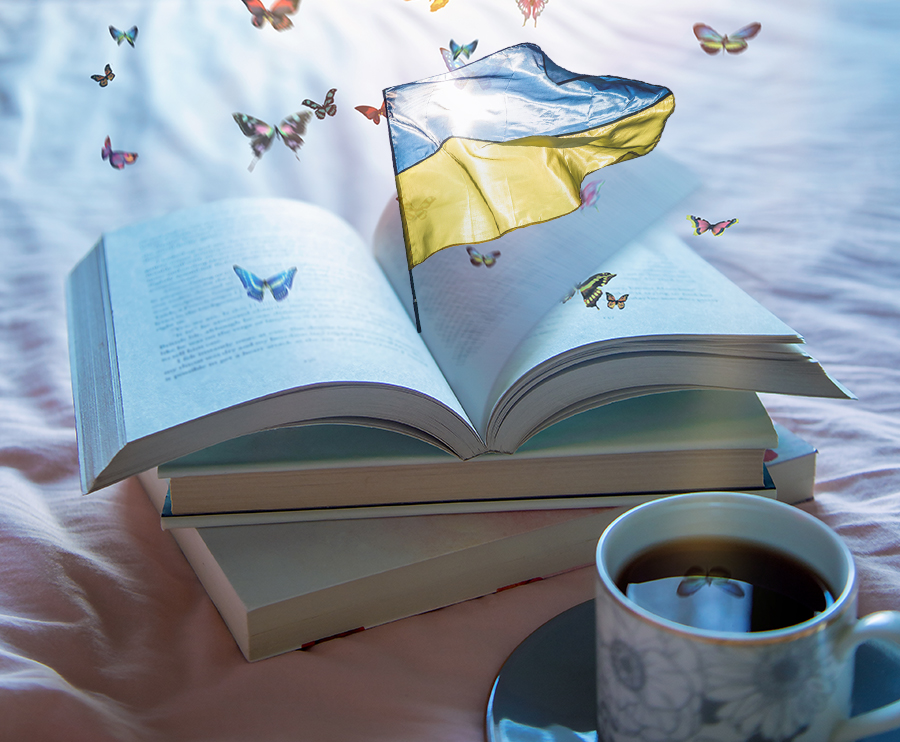 Öppen bok och Ukrainas flagga